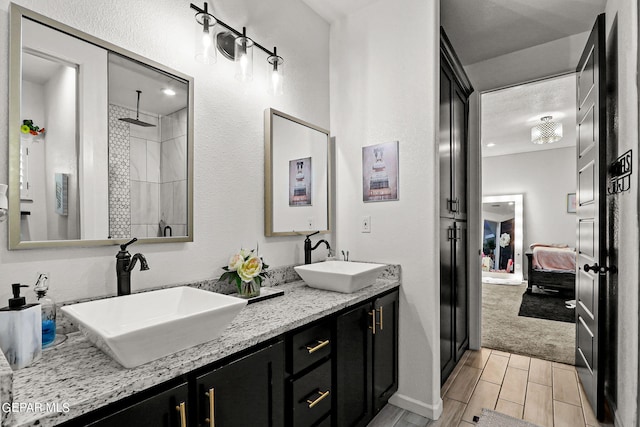 bathroom featuring vanity and walk in shower