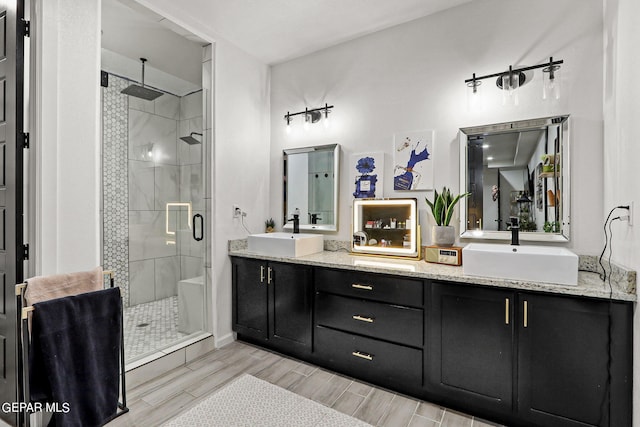 bathroom featuring vanity and walk in shower