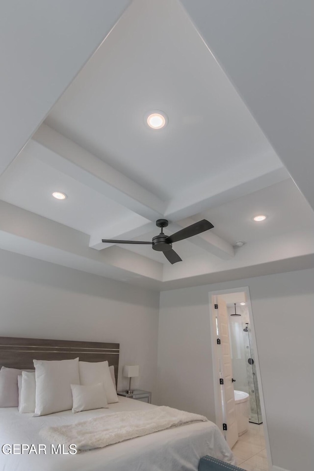 unfurnished bedroom featuring ensuite bathroom and ceiling fan