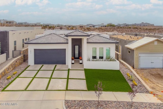 view of front of property featuring a garage