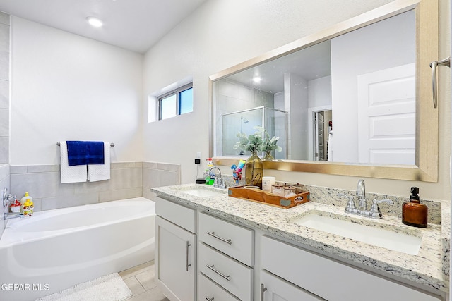 bathroom featuring separate shower and tub, tile patterned flooring, and vanity