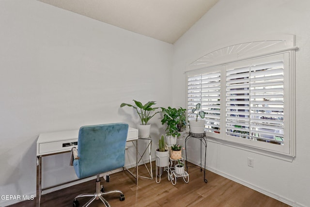 office featuring hardwood / wood-style flooring and vaulted ceiling