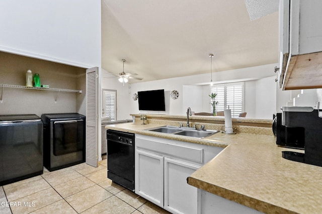 kitchen featuring black appliances, sink, independent washer and dryer, light tile patterned floors, and white cabinetry