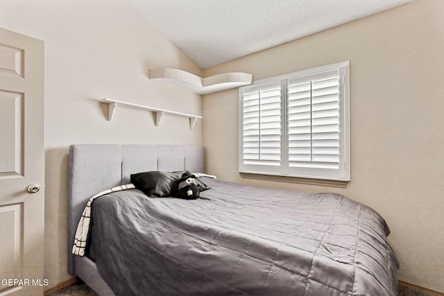 bedroom featuring a textured ceiling