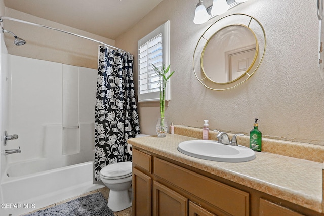 full bathroom with shower / bath combination with curtain, toilet, and vanity