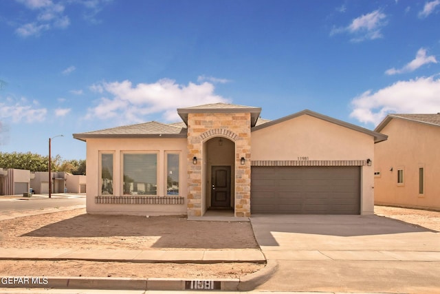 view of front of home with a garage