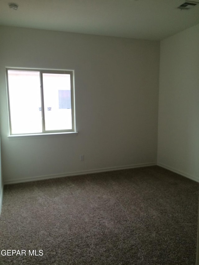 empty room with carpet floors