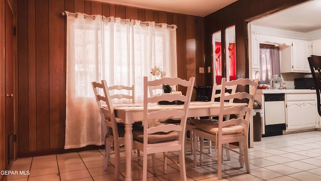 tiled dining room with wooden walls