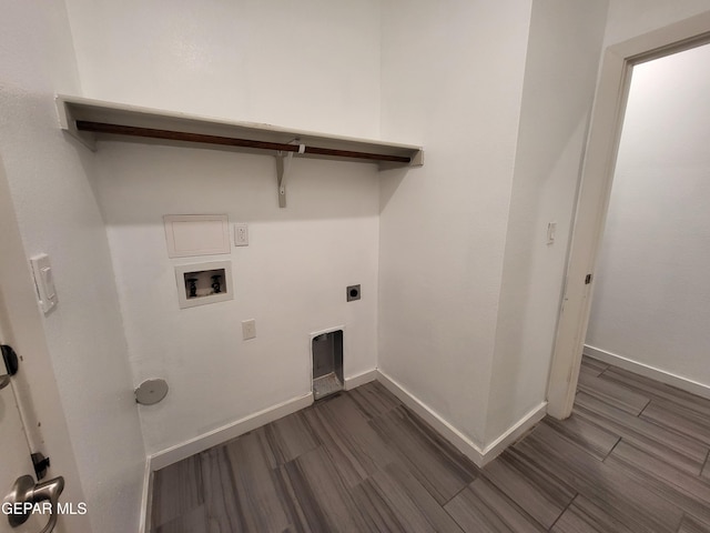 clothes washing area featuring electric dryer hookup, hookup for a washing machine, and dark wood-type flooring