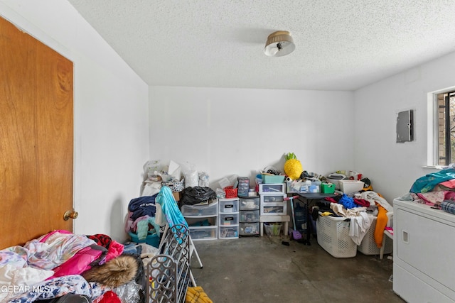 storage area featuring washer / clothes dryer and electric panel