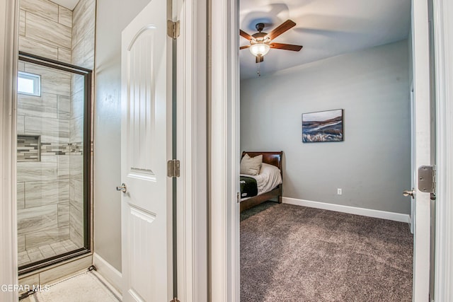 bathroom with ceiling fan and walk in shower