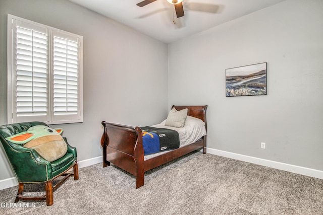 bedroom featuring ceiling fan and light colored carpet