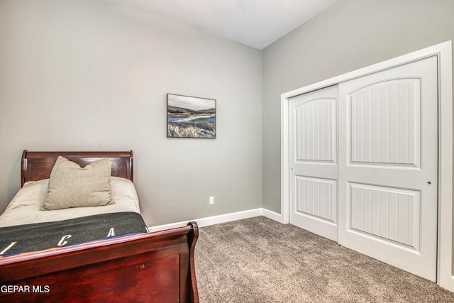 carpeted bedroom featuring a closet