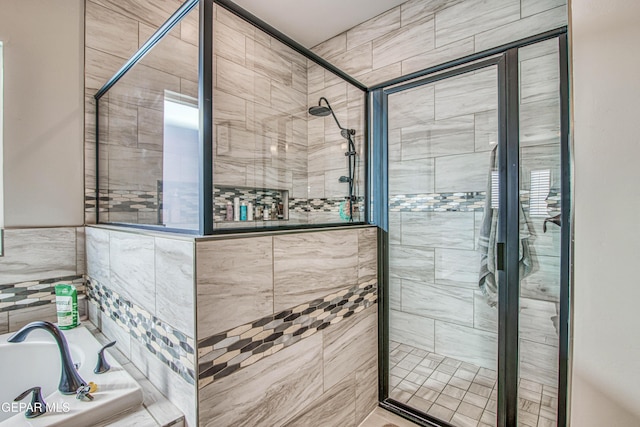 bathroom featuring shower with separate bathtub and tile walls