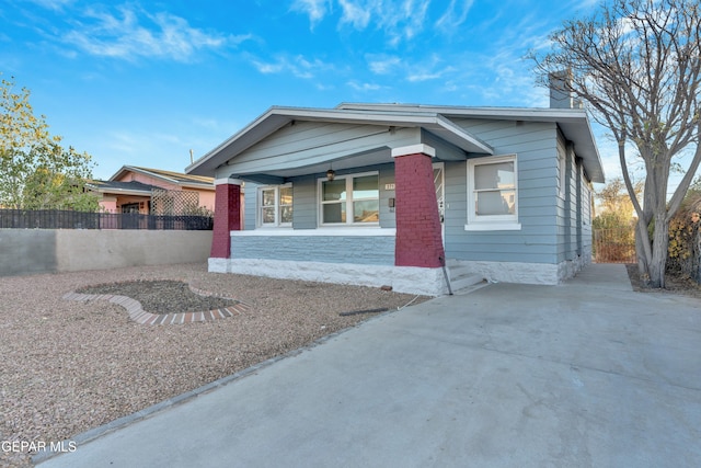 bungalow-style home with covered porch