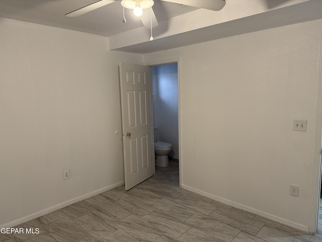 spare room featuring ceiling fan