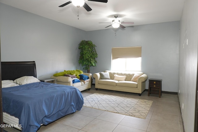 tiled bedroom with ceiling fan