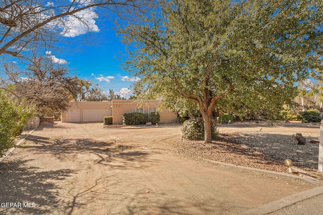 view of yard featuring a garage