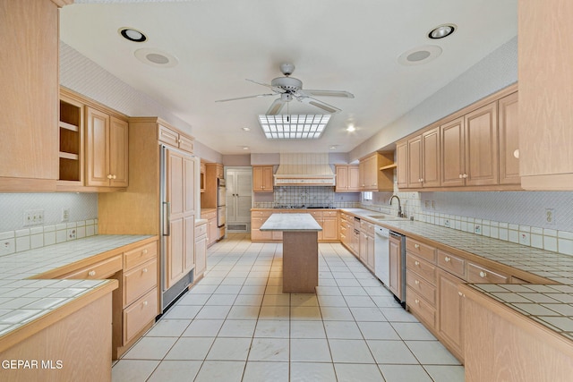 kitchen featuring light tile patterned floors, open shelves, custom exhaust hood, a sink, and tile counters