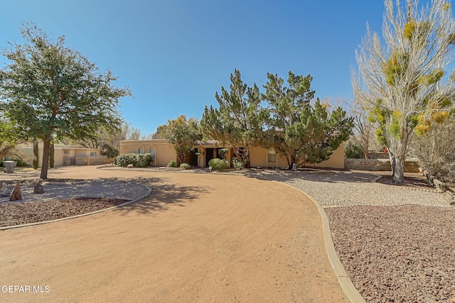 view of front of property featuring stucco siding