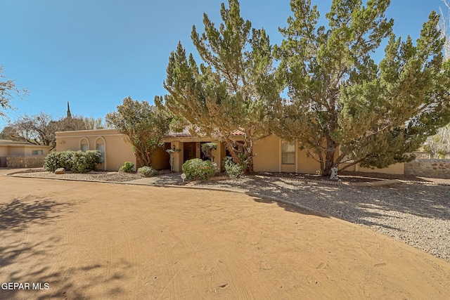 view of front of home with stucco siding