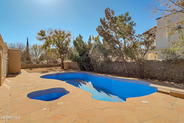 view of pool with a diving board, a fenced in pool, a patio, and a fenced backyard