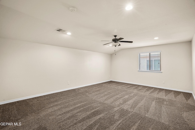 empty room featuring carpet flooring and ceiling fan