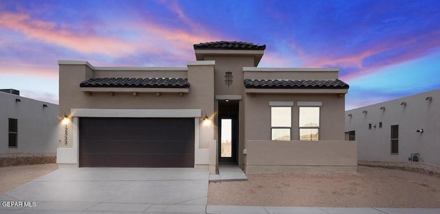 view of front of property featuring a garage