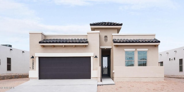 view of front of house with a garage