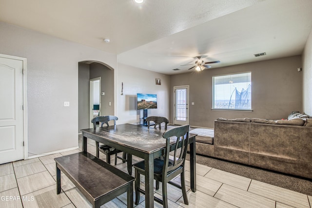 dining area with ceiling fan