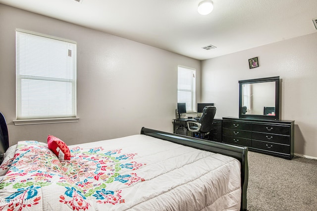 bedroom featuring carpet flooring