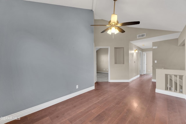 spare room with ceiling fan, lofted ceiling, and hardwood / wood-style flooring