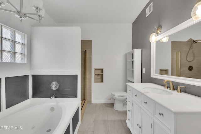 full bathroom featuring separate shower and tub, vanity, and toilet