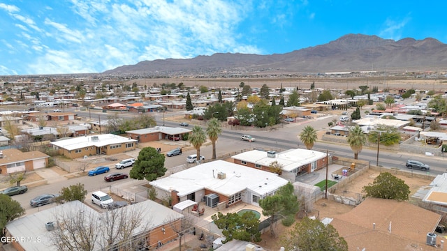 birds eye view of property featuring a mountain view