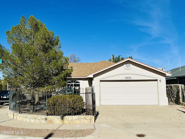 single story home featuring a garage