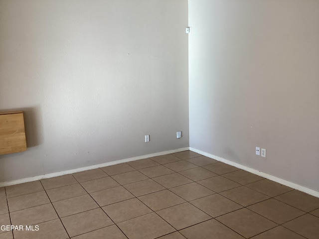 view of tiled spare room