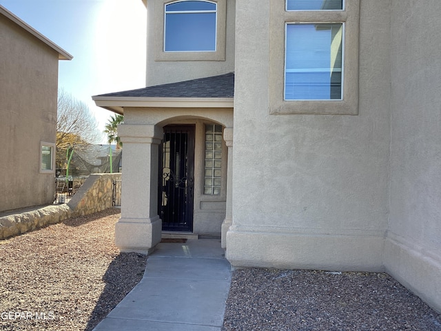 12933 Hidden Grove Dr, El Paso, TX 79938 - entrance to property with a shingled roof and stucco siding