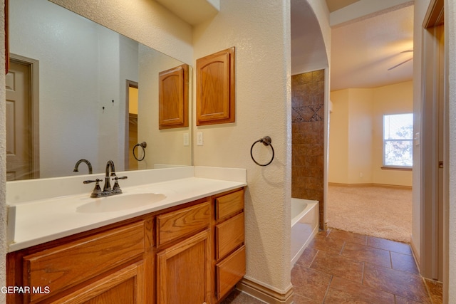 bathroom with shower / tub combination and vanity