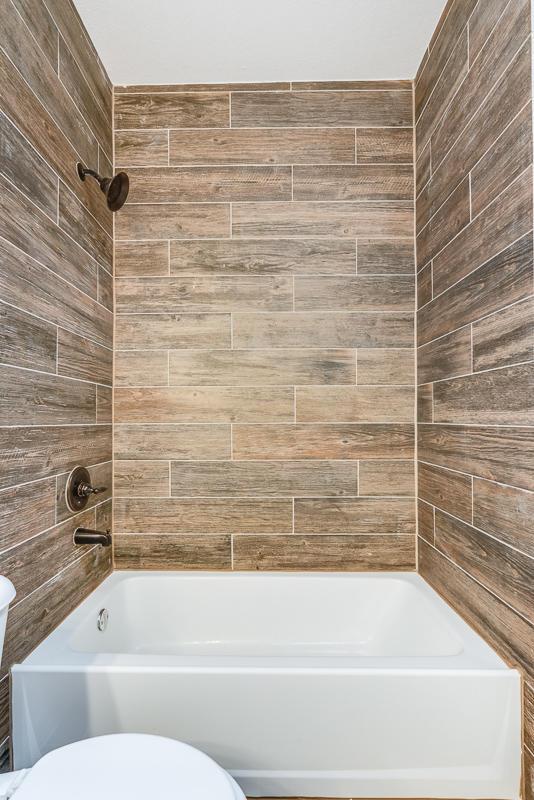 13820 Madero Ave, El Paso, TX 79928 - bathroom with toilet and shower / bathtub combination