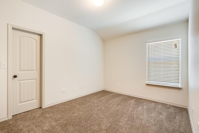 13820 Madero Ave, El Paso, TX 79928 - carpeted empty room featuring vaulted ceiling and baseboards