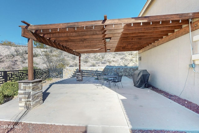 view of patio / terrace featuring a pergola and grilling area