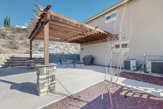 view of patio with a pergola, area for grilling, and cooling unit