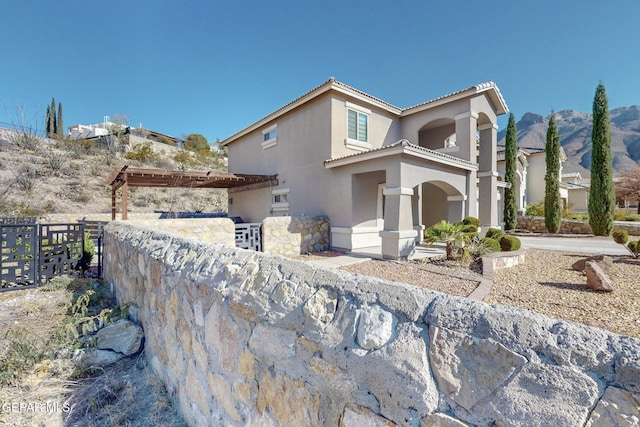 mediterranean / spanish-style home featuring a mountain view