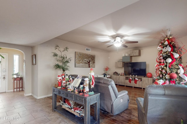 living room featuring ceiling fan