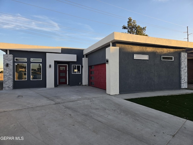 contemporary home featuring a garage