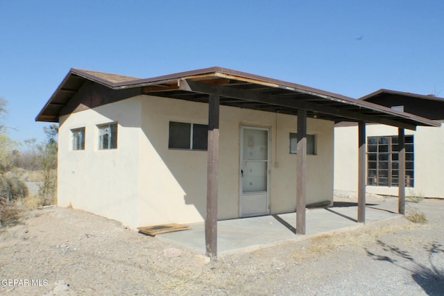 back of house featuring a patio area