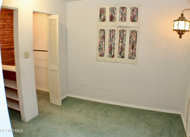 unfurnished bedroom featuring carpet