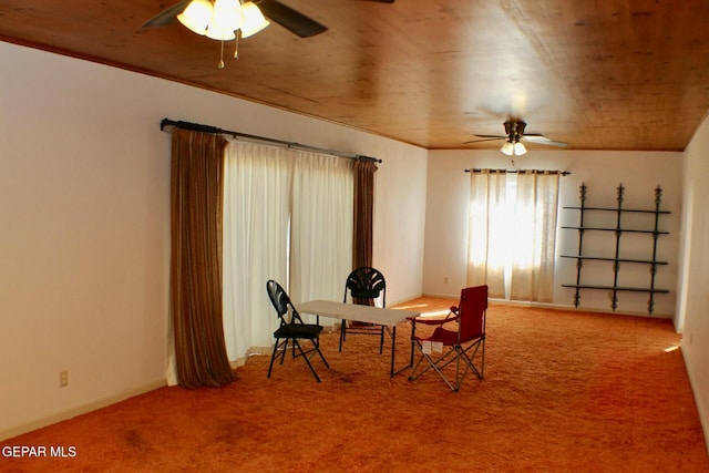 dining room featuring carpet flooring and ceiling fan