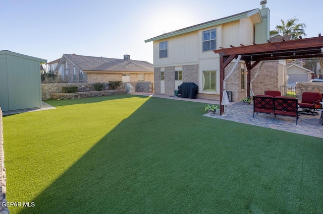 view of yard with a pergola, an outdoor living space, a patio, and a storage shed