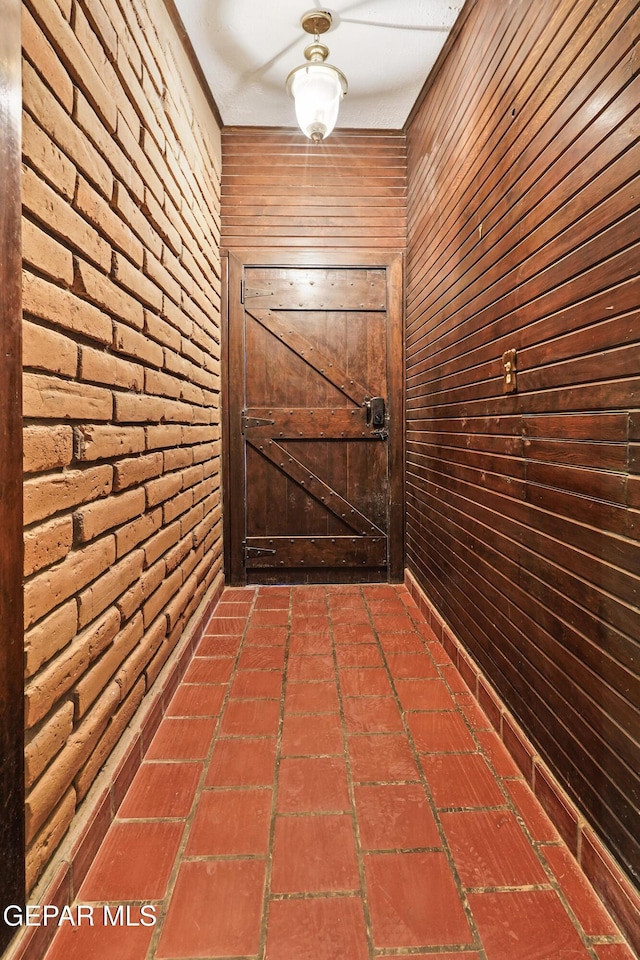 525 N Main St, Dell City, TX 79837 - entryway with wooden walls and brick floors